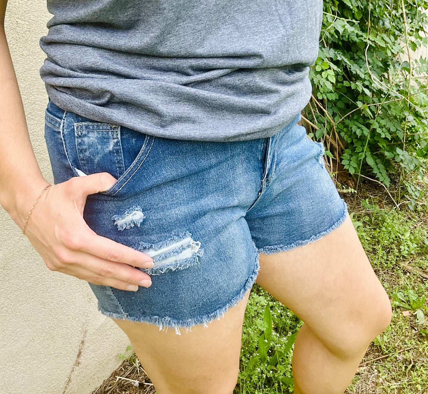 Distressed denim shorts